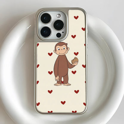 Funda holográfica cromada de George el Curioso con diseño de corazón