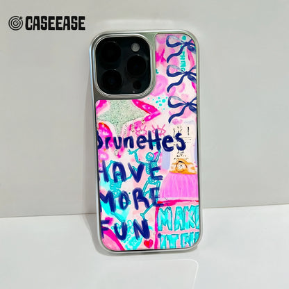 Silver phone case with pink blue graffiti design, rear camera close-up product shot