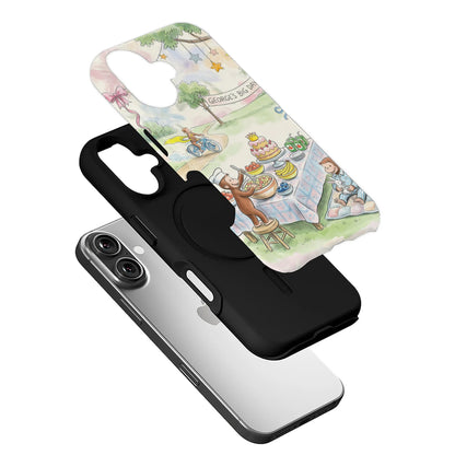 Pastel illustrated monkey birthday phone case with black liner, angled exploded product display