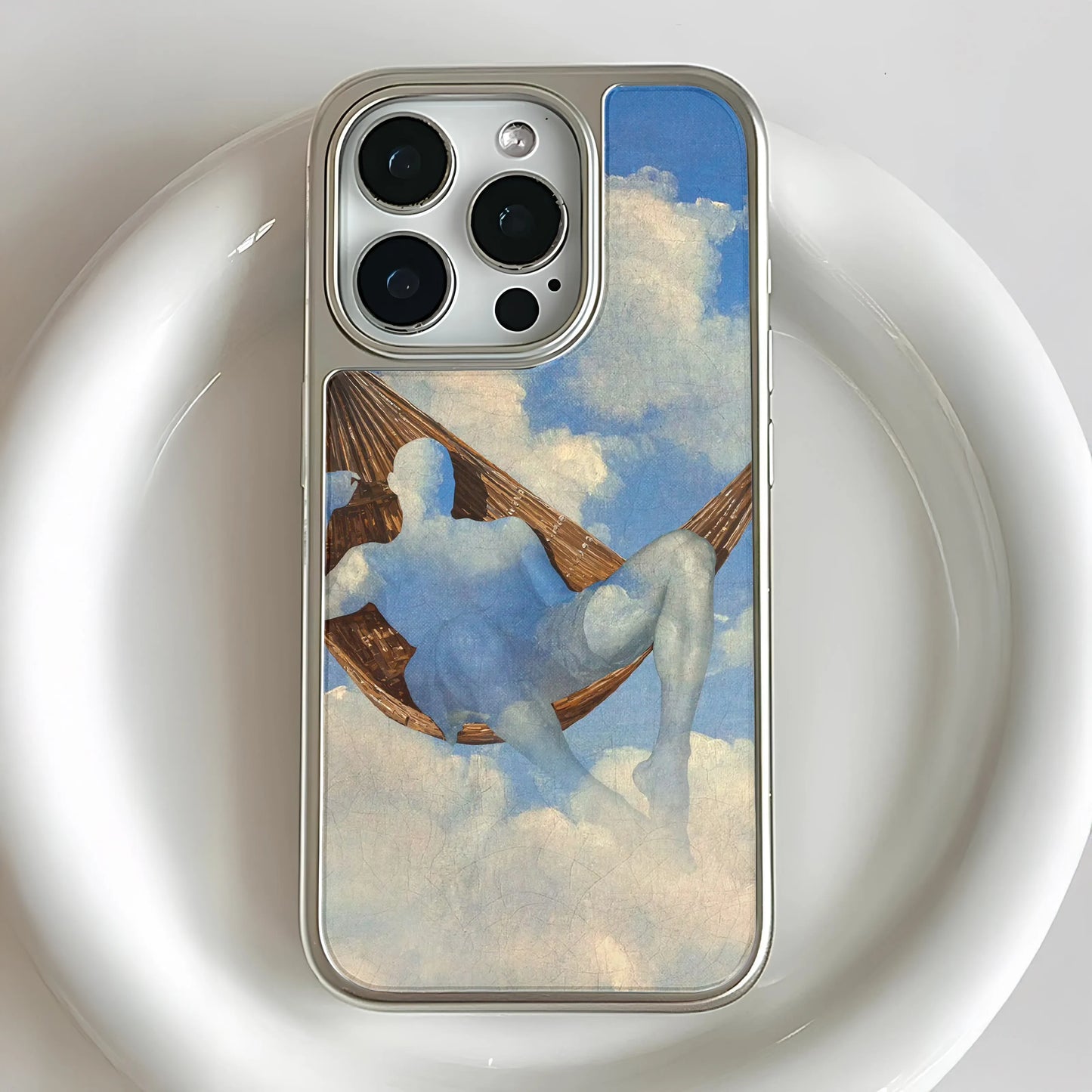 Holographic Chrome Phone Case for iPhone 15 Pro - Dreamy Hammock Cloud Design