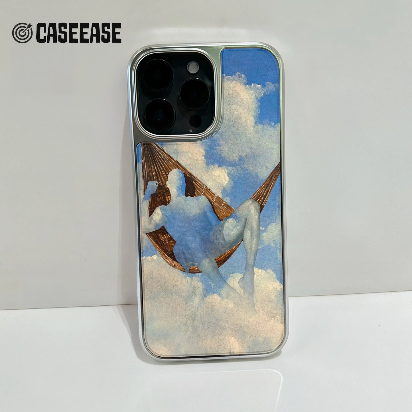 Holographic Chrome Phone Case for iPhone 15 Pro - Dreamy Hammock Cloud Design