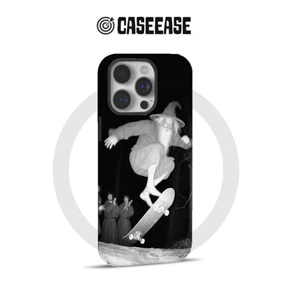 Black CASEEASE phone case with monochrome skateboarding wizard graphic, rear product view