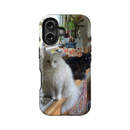 Glossy plastic phone case with white and black cats, full-back print, rear angle