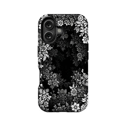 Black phone case with white floral pattern, rear camera cutout, product back view