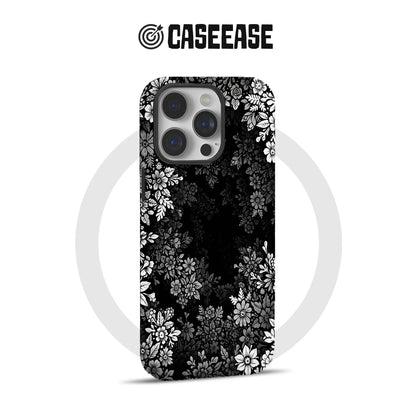 Black phone case with white floral pattern, rear angle for CASEEASE product page